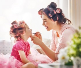 Mother teaches daughter make-up Stock Photo 03