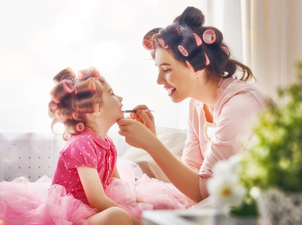 Mother teaches daughter make-up Stock Photo 03