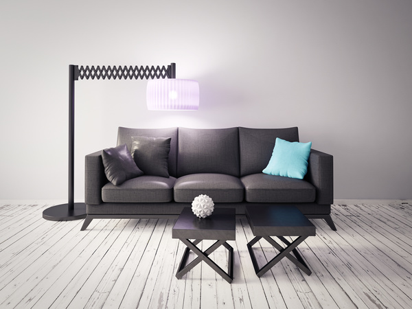 Retractable floor lamp and sofa Stock Photo