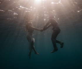Romantic couple in the water Stock Photo