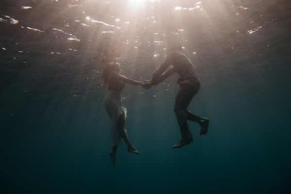 Romantic couple in the water Stock Photo