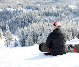 Skier resting on the snow Stock Photo
