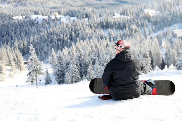 Skier resting on the snow Stock Photo