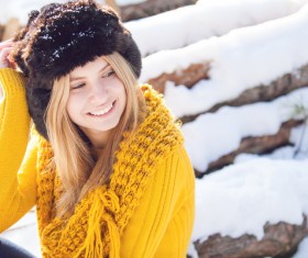 Smiling woman wearing fur hat Stock Photo