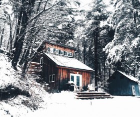 Snow-covered cottage Stock Photo