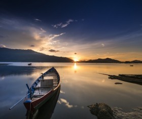 Sunset lake boat landscape Stock Photo