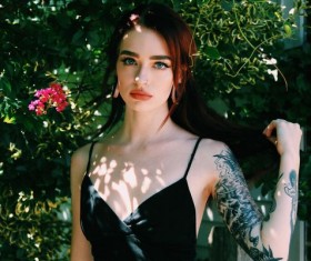 Tattoo girl with nose ring Stock Photo