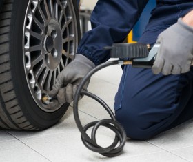 To inflate car tires Stock Photo
