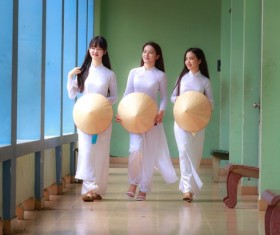 Vietnamese woman in white cheongsam Stock Photo