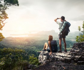 Watch the sunrise backpack Lover Stock Photo