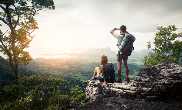 Watch the sunrise backpack Lover Stock Photo