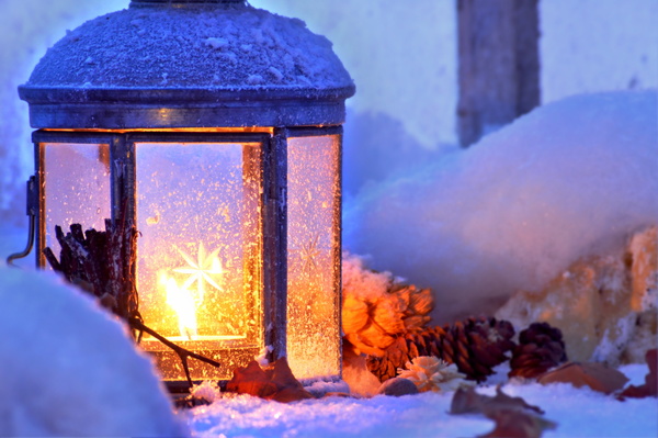 Winter outdoor lighted lantern Stock Photo
