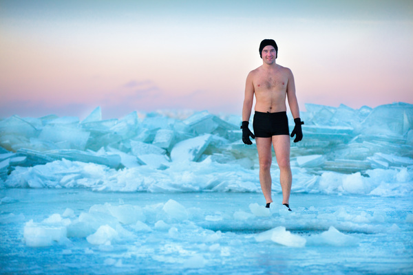 Winter swimming man Stock Photo