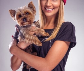 Woman holding pet dog Stock Photo 04