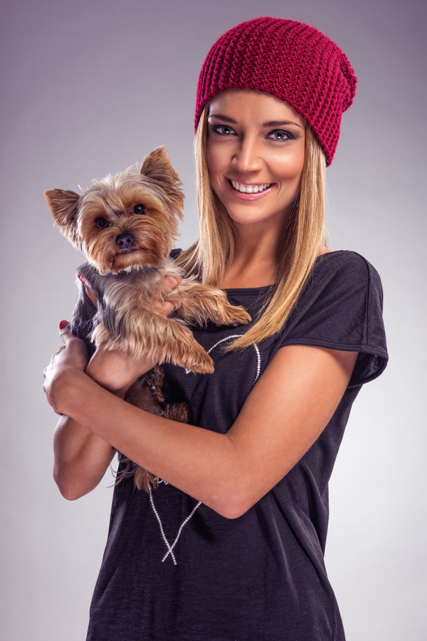 Woman holding pet dog Stock Photo 04
