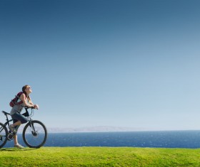 Woman riding mountain bike trip Stock Photo 02