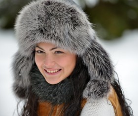 Woman wearing cotton cap outdoors in winter Stock Photo 02