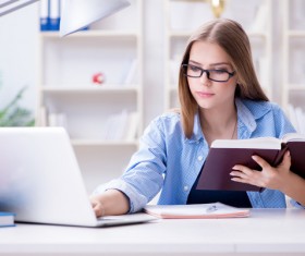 female college student using laptop Stock Photo