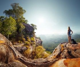 woman on the top of the hill Stock Photo