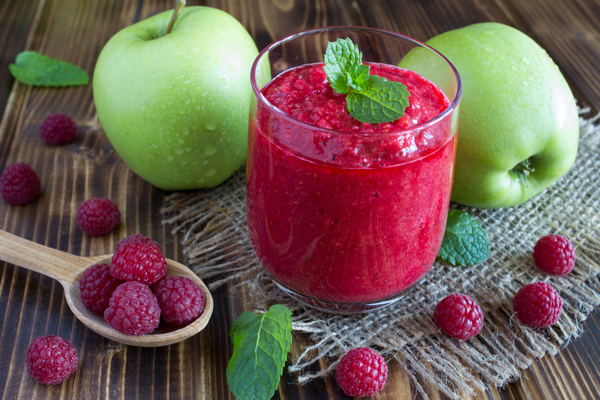 Apple and raspberry juice Stock Photo