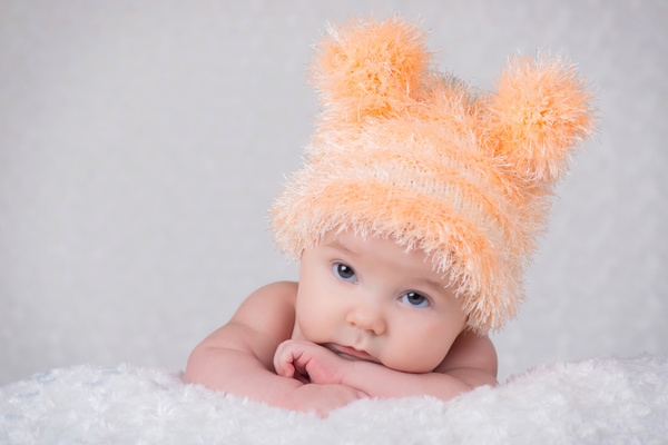 Baby wearing a knit cap Stock Photo 01