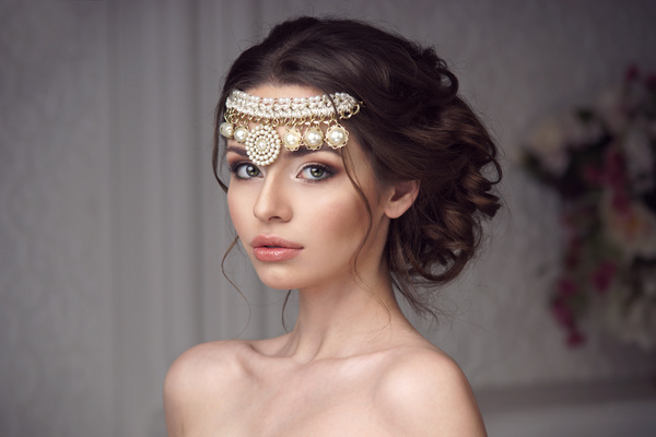 Beautiful girl wearing pearl headdress Stock Photo