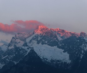 Beautiful snowy rocky mountain peak Stock Photo