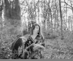 Black white picture of woman in forest Stock Photo