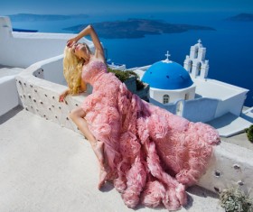 Blonde in pink dress by the sea Stock Photo 02
