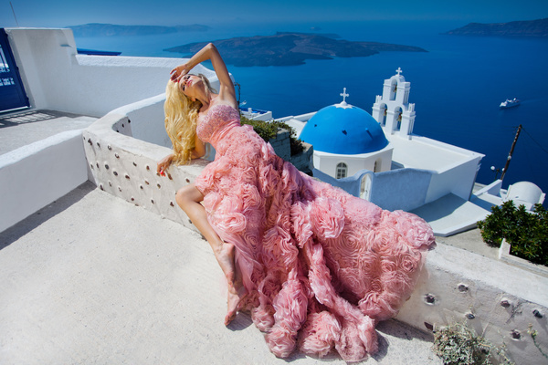Blonde in pink dress by the sea Stock Photo 02