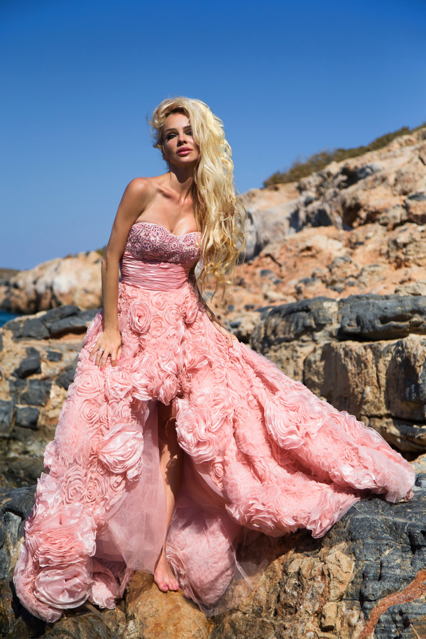 Blonde in pink dress by the sea Stock Photo 03