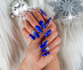 Blue painted nail art Stock Photo