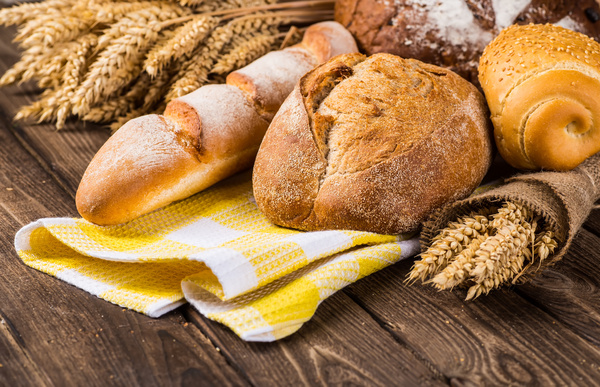 Bread and wheat on the desktop Stock Photo 01