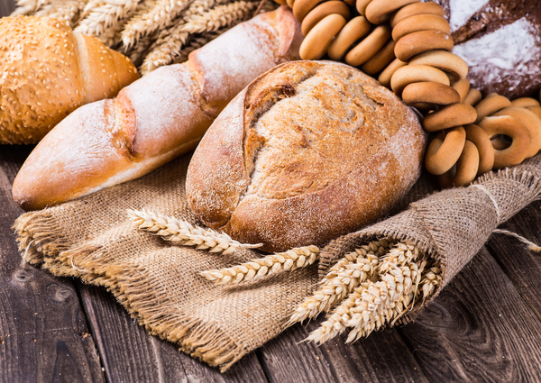 Bread and wheat on the desktop Stock Photo 02