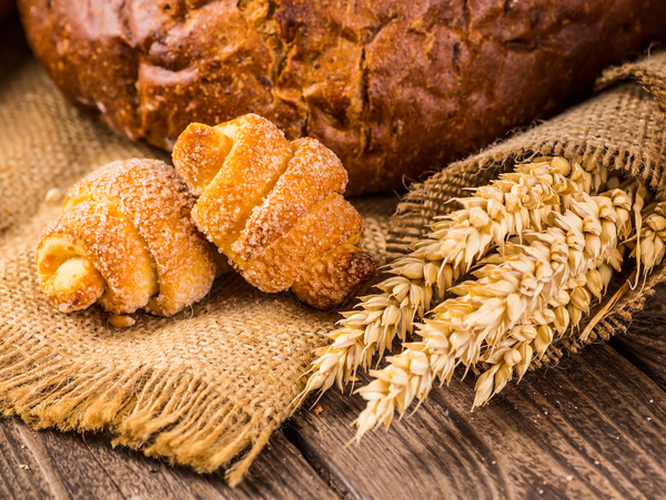 Bread and wheat on the desktop Stock Photo 05