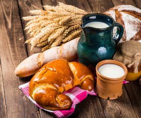 Bread wheat and milk on the desktop Stock Photo 01