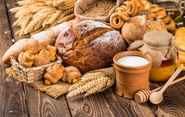 Bread wheat and milk on the desktop Stock Photo 02