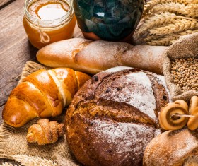 Bread wheat and milk on the desktop Stock Photo 04