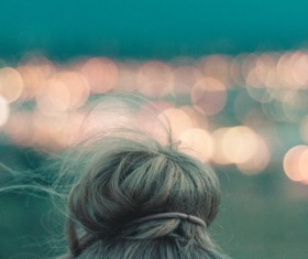 Closeup of woman hairstyle and bokeh lights Stock Photo