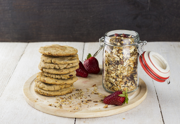 Cookies and oats on the desktop plate Stock Photo