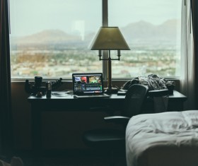 Cozy well equipped bedroom Stock Photo