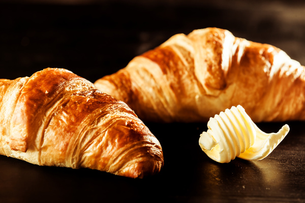 Croissant with butter Stock Photo