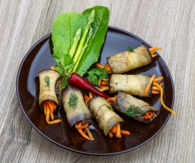 Eggplant meat rolls with vegetables Stock Photo
