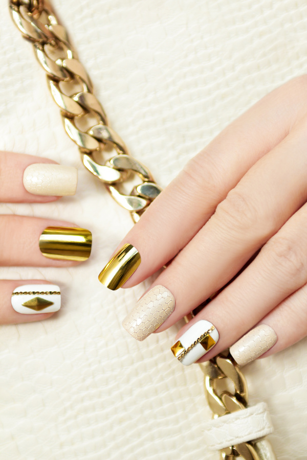 Fashion golden nail art Stock Photo