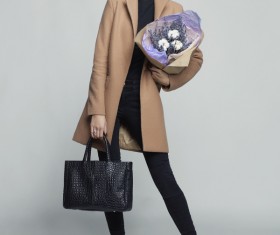 Fashionable woman receiving flowers Stock Photo 02