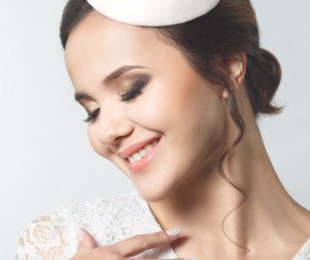 Happy bride wearing a wedding dress Stock Photo