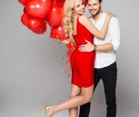 Happy couple and heart balloons Stock Photo 05