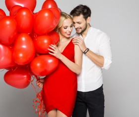 Happy couple and heart balloons Stock Photo 08