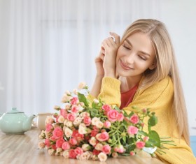 Happy girl holding a bouquet of roses Stock Photo 03