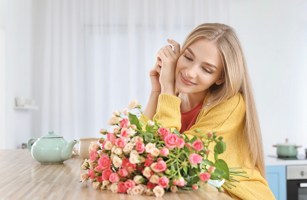 Happy girl holding a bouquet of roses Stock Photo 03